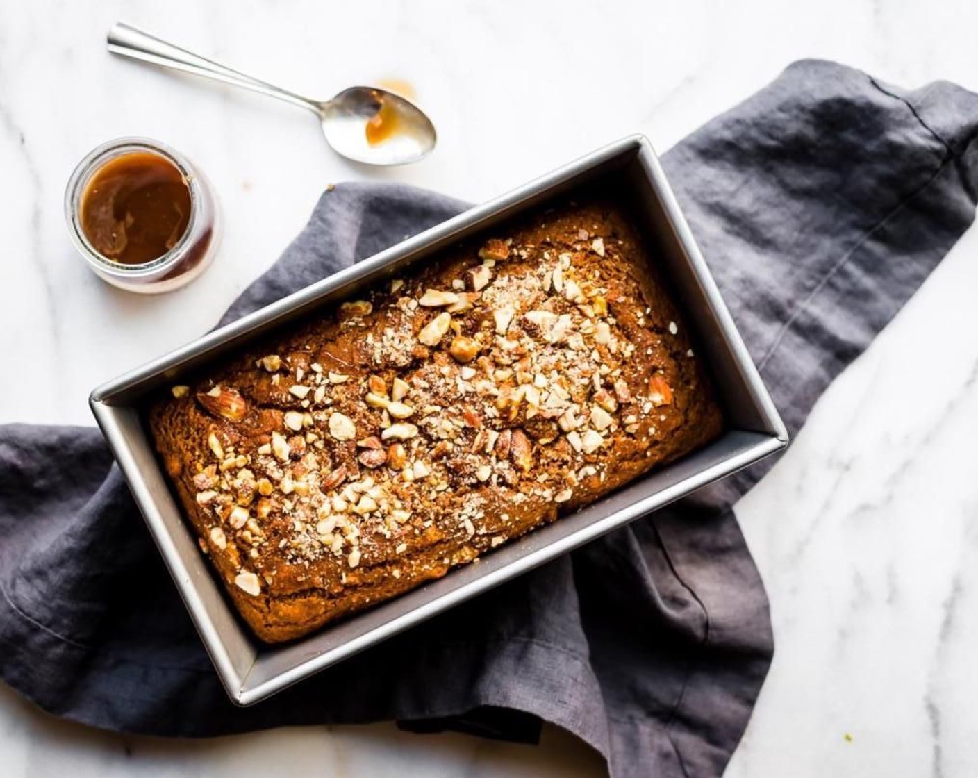 step 5 Pour into your 9x9-inch pan. Add a sprinkle of crushed almonds to the top. Bake for 30 to 35 minutes, or until the center comes out clean with a toothpick or knife. Remove and let cool.