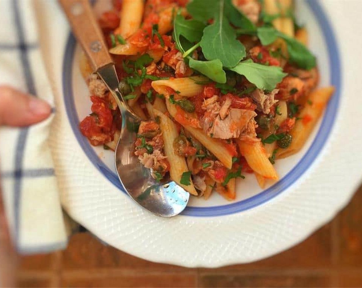 step 5 Scoop the pasta and tuna sauce onto deep plates. Sprinkle with extra fresh parsley serve.