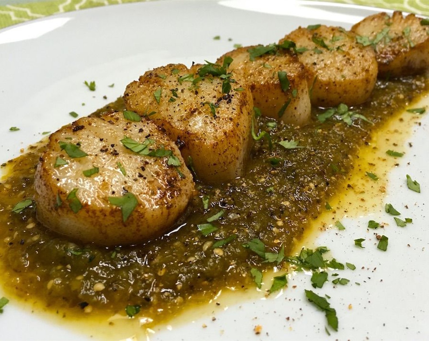 step 12 If cooking in batches, remove finished scallops to a warm plate and tent with foil to keep warm. Serve immediately with the salsa verde.