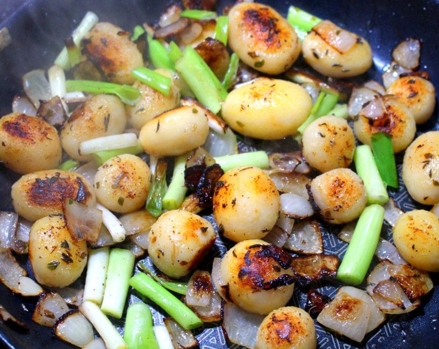 step 5 When browned, add Scallion (1/2 cup) and sauté another minute.