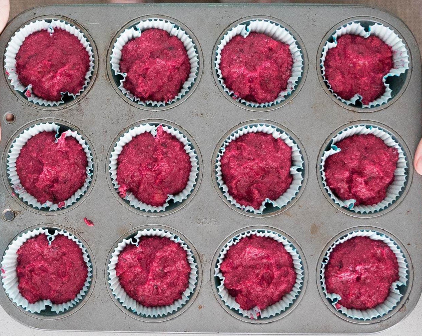 step 6 Place batter into muffin tin cups.