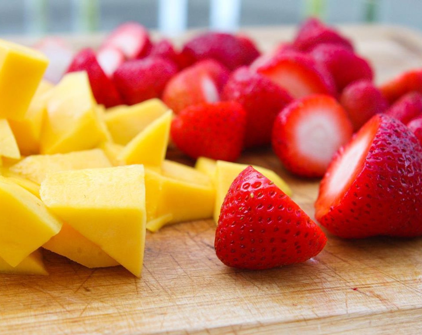 step 1 Chop the Mangoes (2 cups) and Fresh Strawberries (2 cups).