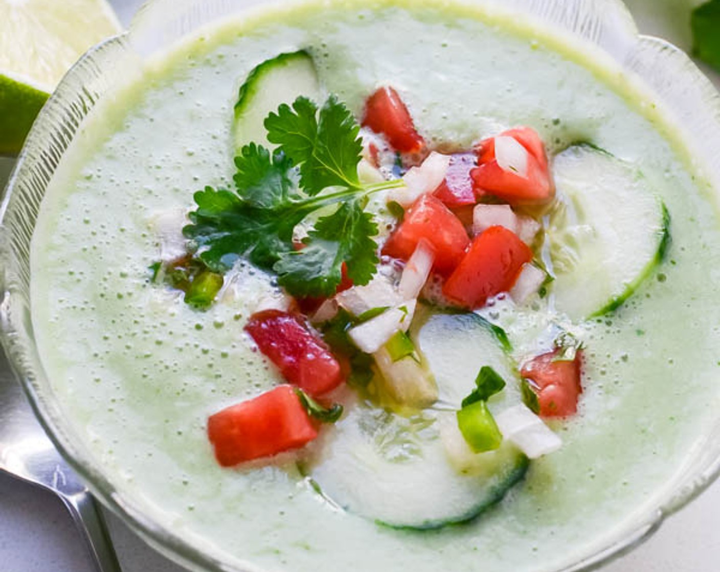 step 3 To serve, ladle cold soup into chilled bowls. Float one or two slices of cucumber on the soup and carefully spoon pico de gallo over the soup and sliced cucumber.  Be careful so that the garnish doesn’t plop to the bottom, but rests gently on top. Enjoy!