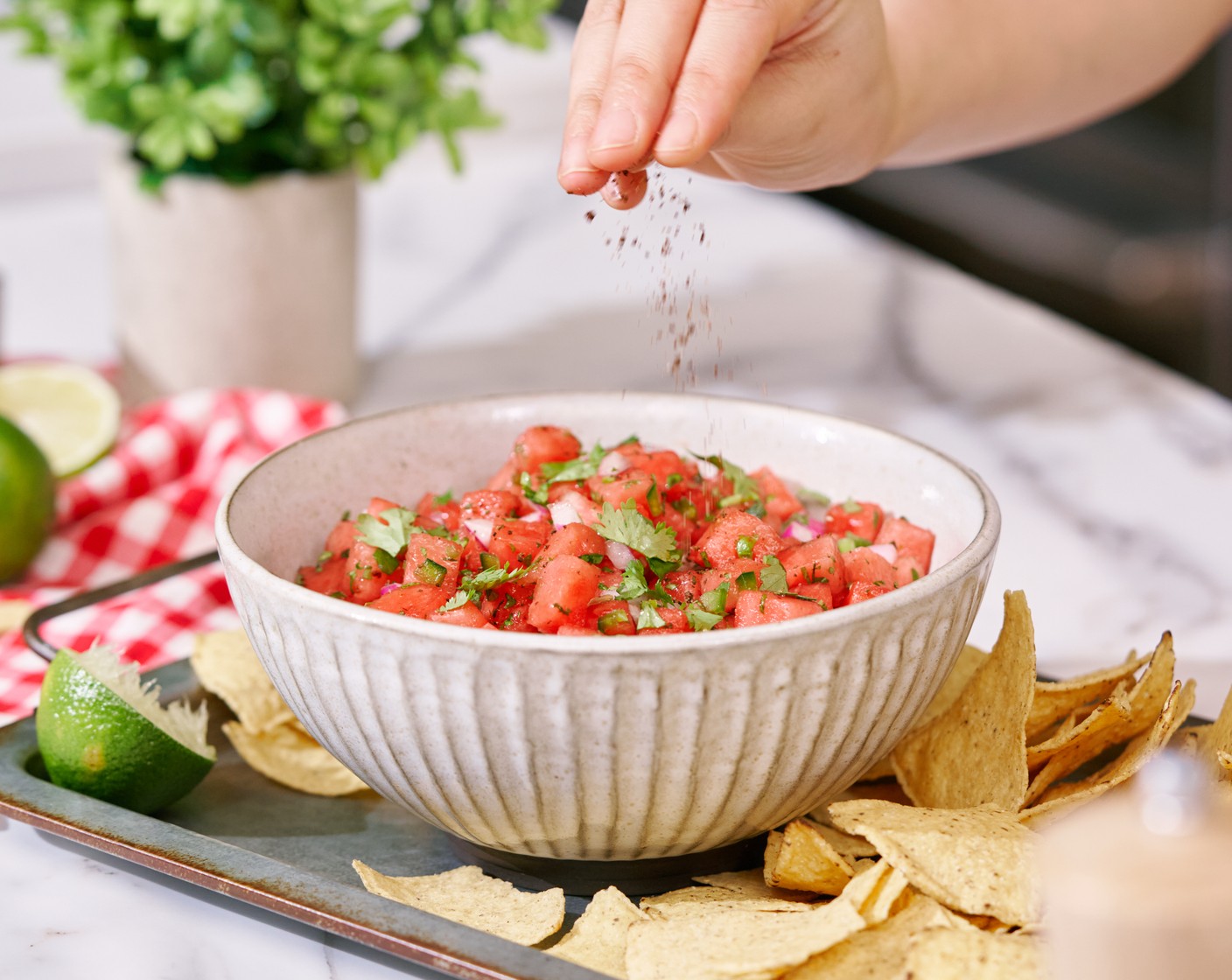 step 3 Squeeze some more lime juice and sprinkle more tajin on top. Serve salsa as a side dish along with the main dish or as a snack with Tortilla Chips (as needed).