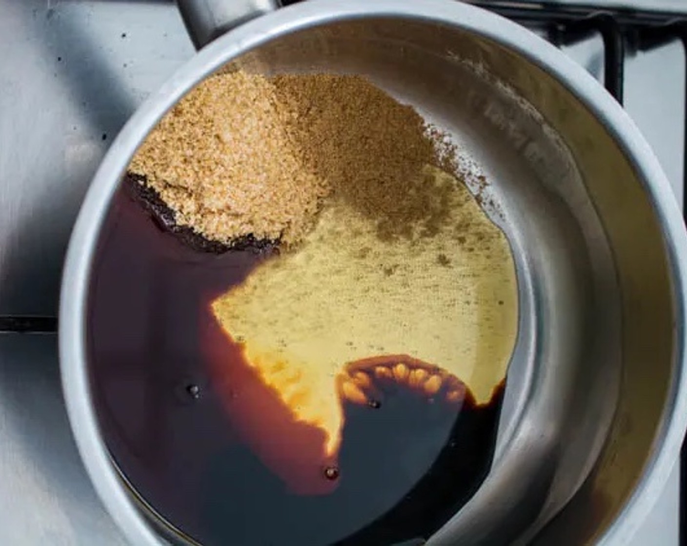 step 5 In a small saucepan, prepare the sauce by combining Honey (2 Tbsp), Light Soy Sauce (2 Tbsp), Dark Soy Sauce (1 tsp), Brown Sugar (2 Tbsp), and Chinese Five Spice Powder (1/4 tsp). Place the saucepan over medium heat.