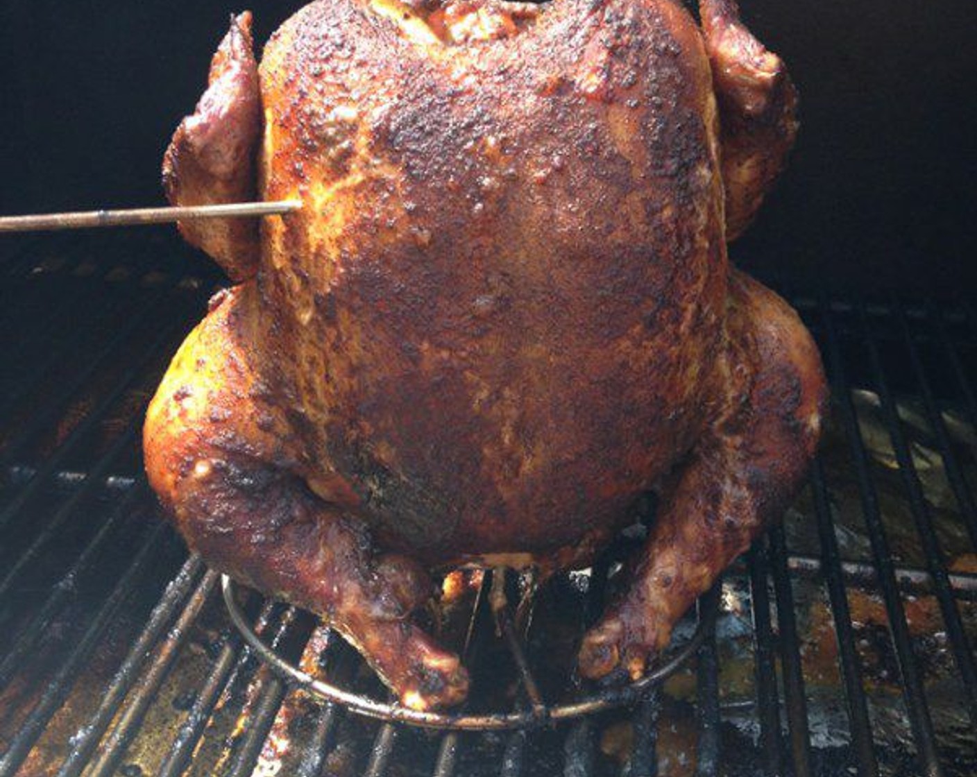 step 8 Once the chicken is sitting on the can, it’s ready to go on the smoker. The cooking temperature I use for smoked chicken is 300 degrees F (150 degrees C). Once the smoker is running at 300 degrees F (150 degrees C), place the beer can chicken on the pit and close the lid. It will take about 2 hours depending on the size of the chicken.