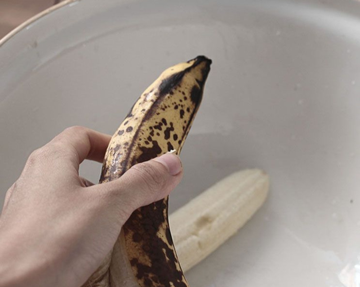 step 2 Peel Bananas (3) and mash them with a fork or blend with a hand blender in a large mixing bowl.