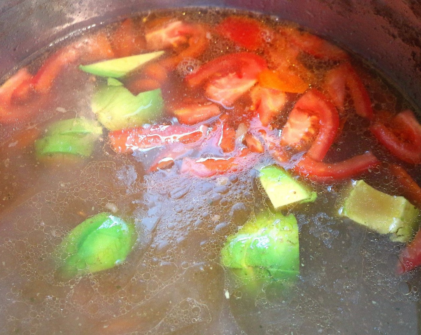 step 4 Add Carrots (4), simmer until the carrots are soft, add Avocado (1) and Tomato (1) to the soup. Simmer for 1 minute, remove from heat, season with Cayenne Pepper (to taste) and Ground Nutmeg (to taste); check/adjust seasoning.