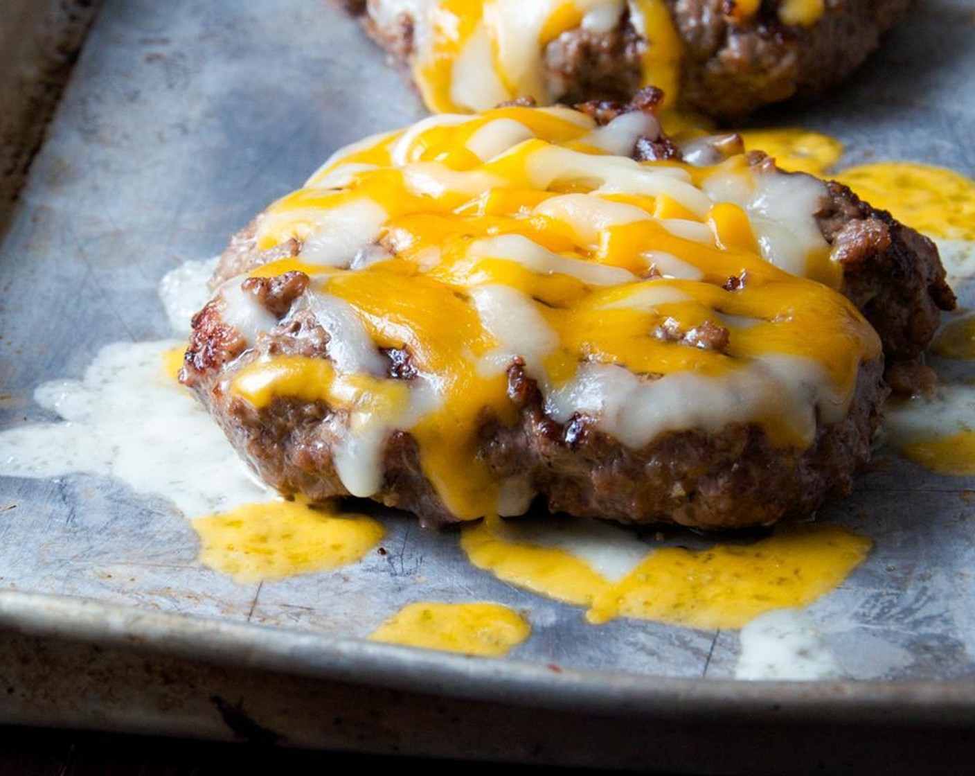 step 10 Transfer burgers to a baking sheet or cutting board.