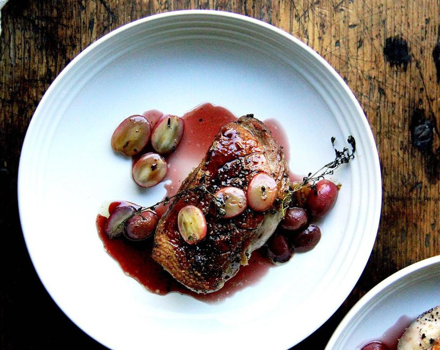 Perfectly Cooked Duck Breasts with Banylus Gastrique and Roasted Grapes