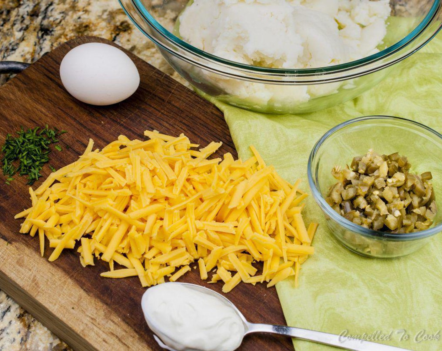 step 1 In a large bowl stir together Mashed Potatoes (3 cups), Sour Cream (2 Tbsp), Egg (1), Kosher Salt (1/2 Tbsp), and Ground Black Pepper (1/2 tsp) until well combined.