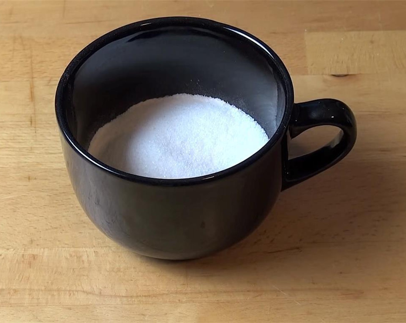 step 1 In an extra large mug, add Self-Rising Flour (1/4 cup) and Granulated Sugar (1/4 cup).