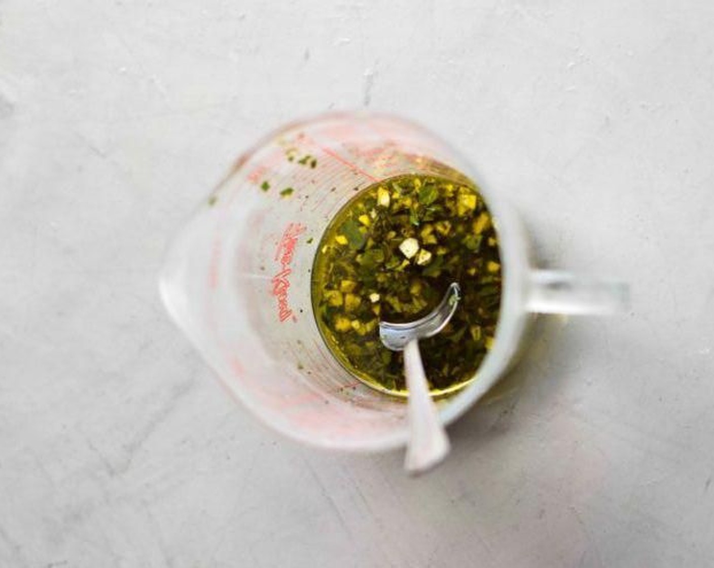 step 5 Add the herbs to a bowl with the Extra-Virgin Olive Oil (1 2/3 Tbsp). Zest and juice one Lemon (1) and crush the Garlic (6 cloves), adding them to the marinade. Season with Coarse Sea Salt (to taste) and Ground Black Pepper (to taste) and stir to combine.