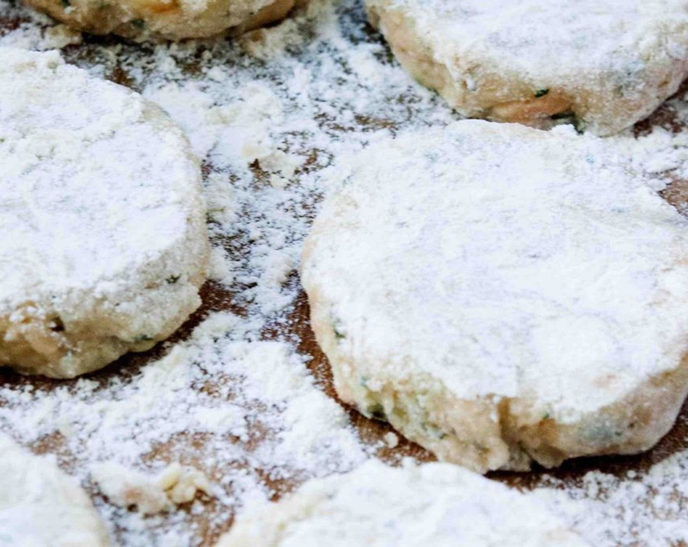 step 7 Using your hands divide the mixture into 8 large or 12 small balls and pat and shape each ball into a fishcake, roughly 2 centimeters thick. Coat them in All-Purpose Flour (4 Tbsp).