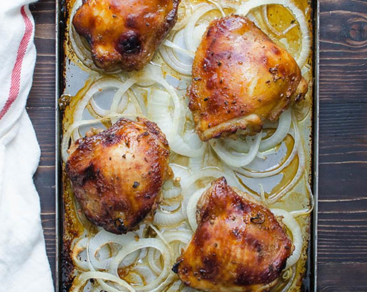 step 9 To serve, arrange the onions on a plate and top with the chicken thighs. Sprinkle with Fresh Cilantro (to taste), Lime Wedges, and sliced additional Serrano Chilis (to taste) if desired.