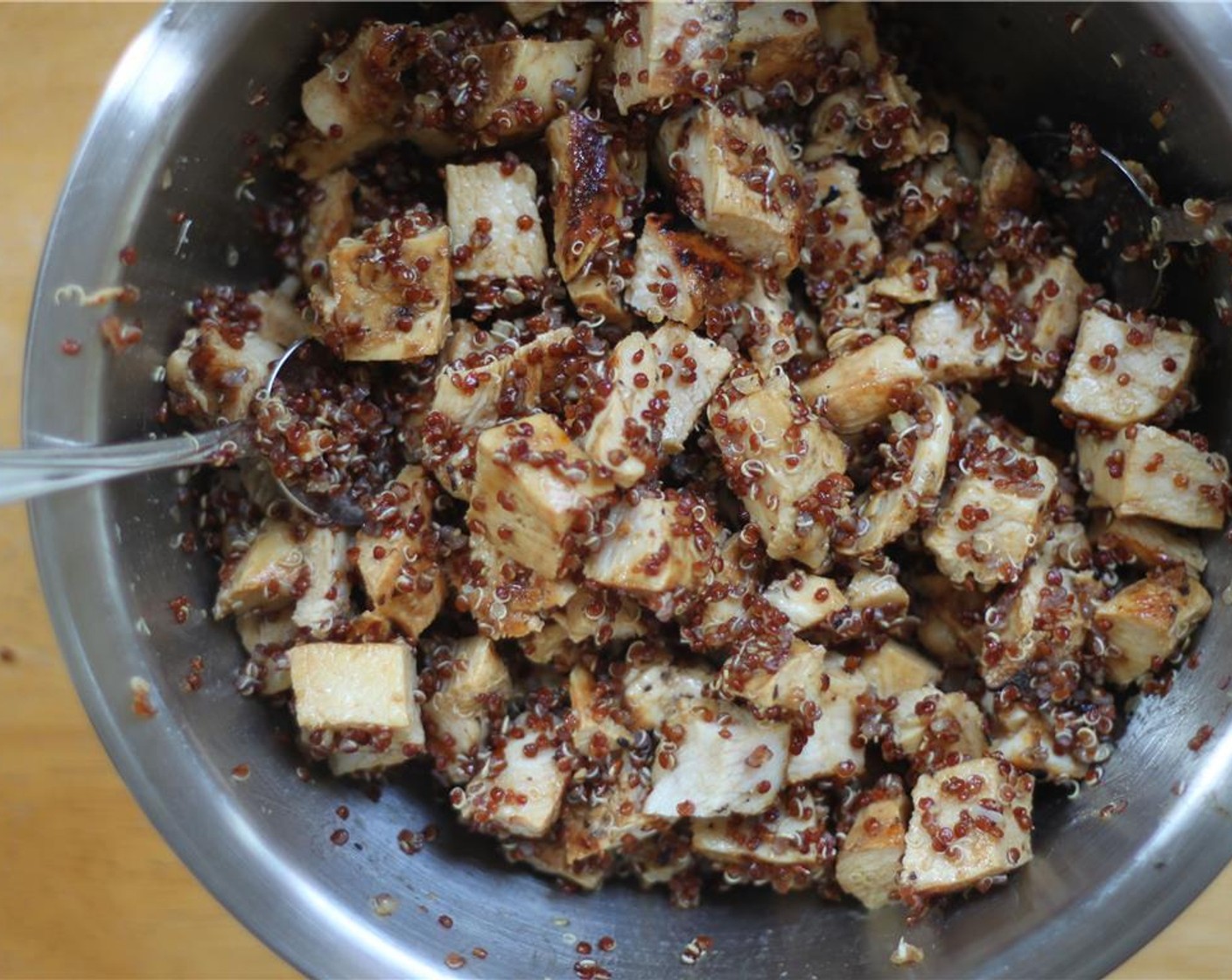 step 7 Toss the chicken with quinoa. Dried Cranberries (3/4 cup), Slivered Almonds (3/4 cup), scallion and dressing. Add Salt (to taste) and Ground Black Pepper (to taste).