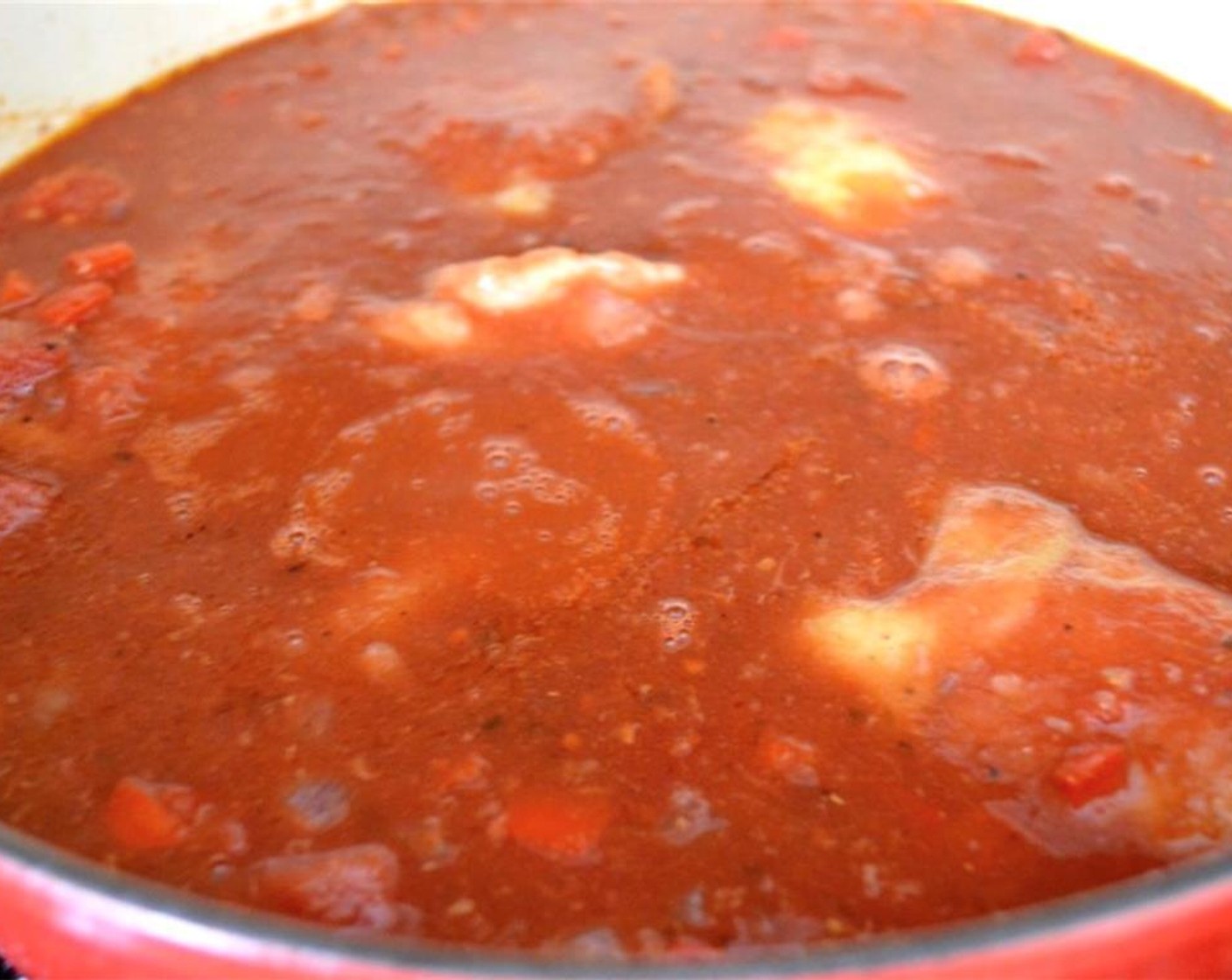 step 10 Add the chicken back in and bring the sauce to a low boil. Reduce it to a simmer and let it cook for 30 minutes.
