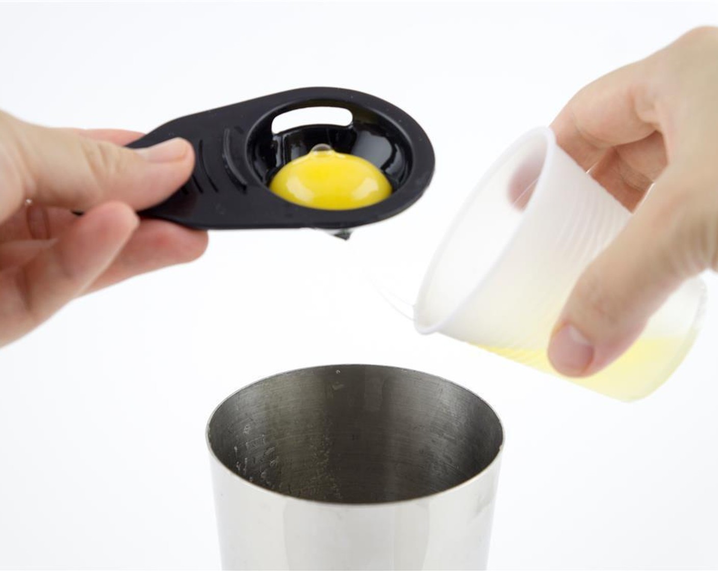 step 2 Separate the Eggland's Best Classic Egg (1) white from the yolk and add into the shaker.
