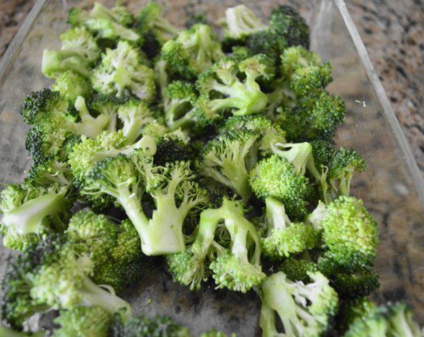 step 3 Transfer the Broccoli (1 head) florets into a baking dish and give them a generous pinch of Salt (to taste).