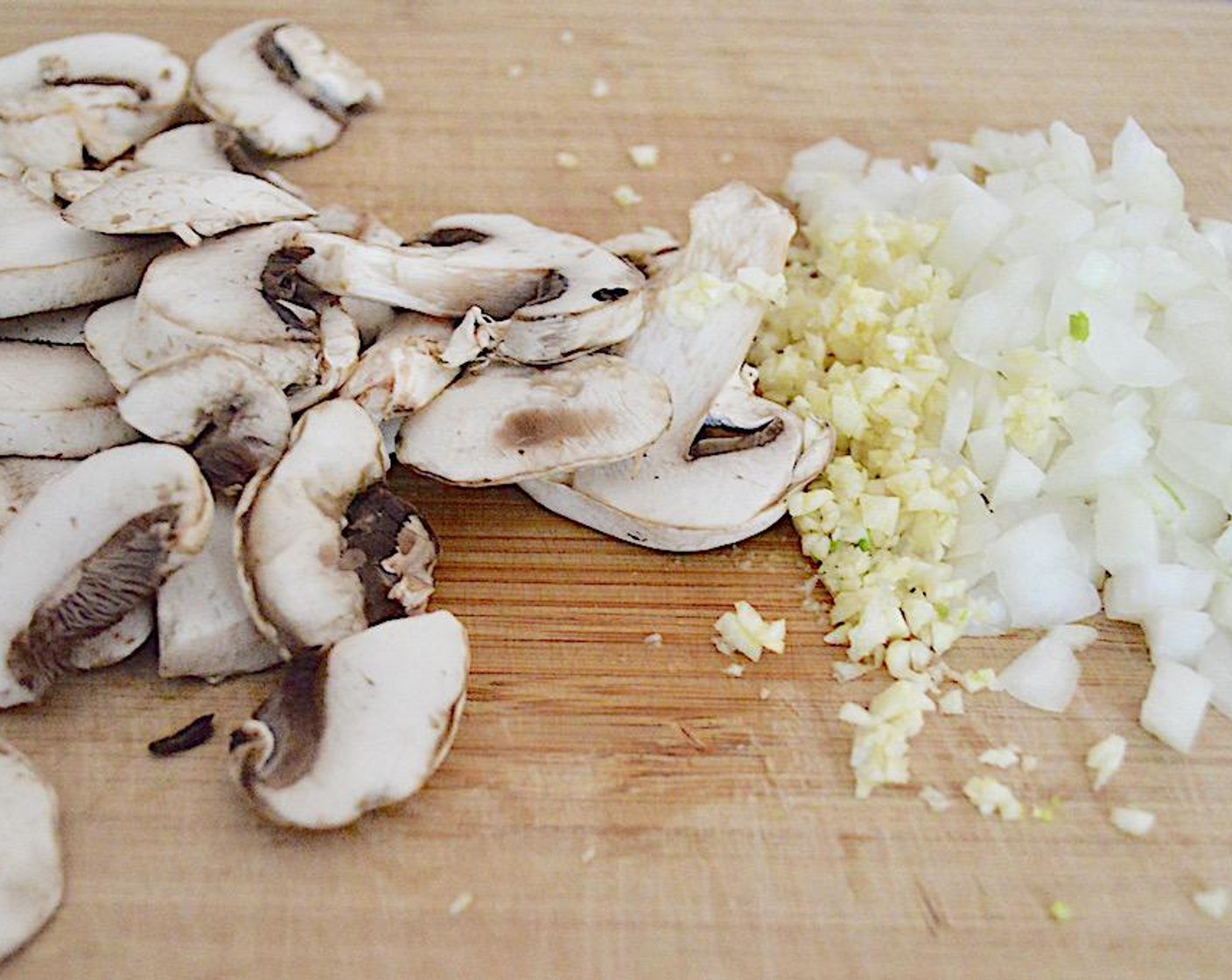 step 1 Get out a large pot or dutch oven and heat the Olive Oil (1 dash) in it over medium high heat. Add the White Mushroom (1 cup), Onion (1), and Garlic (3 cloves) and let them get soft and fragrant for about 2-3 minutes.