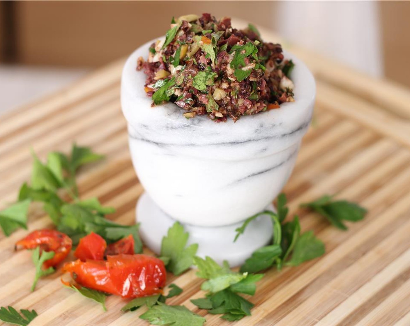 step 2 Process to combine until slightly chunky, scraping down the sides of the bowl as needed. Measure out 1/2 cup of tapenade and set aside.