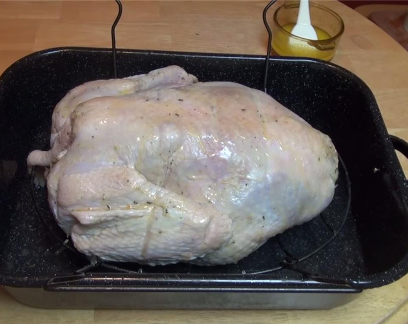 step 11 Flip it over, and brush the back side. Put a few cups of water into bottom of the pan. Leave it on the breast, and roast 45 minutes.