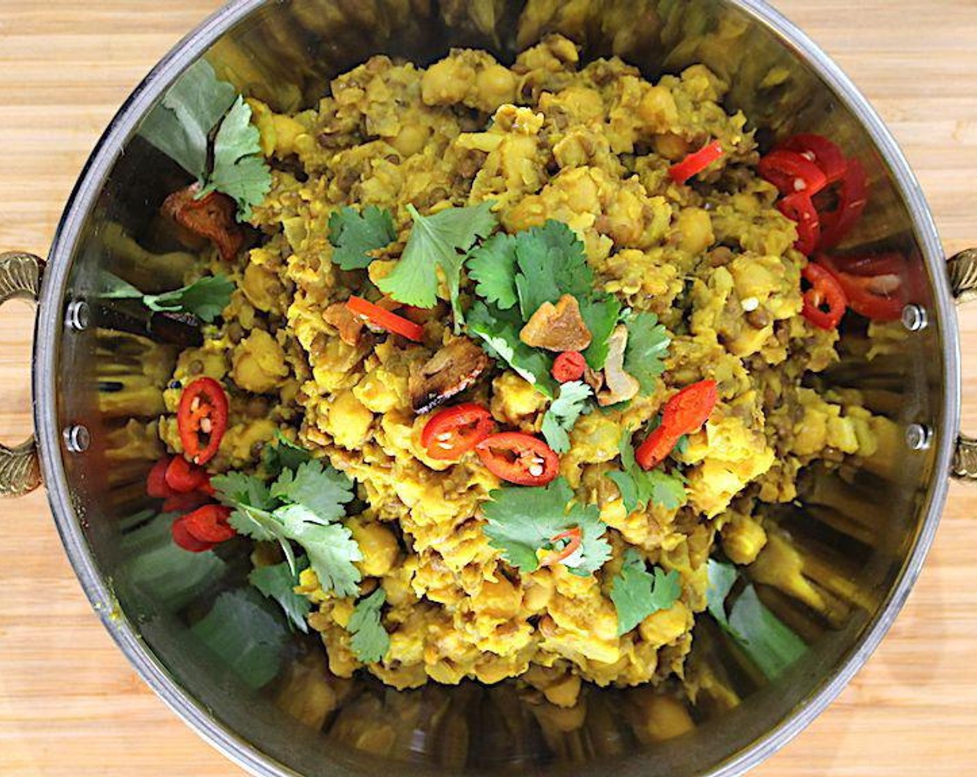 step 5 Serve Dhal topped with crispy garlic, Red Chili Pepper (1), and Fresh Cilantro (to taste). Enjoy!