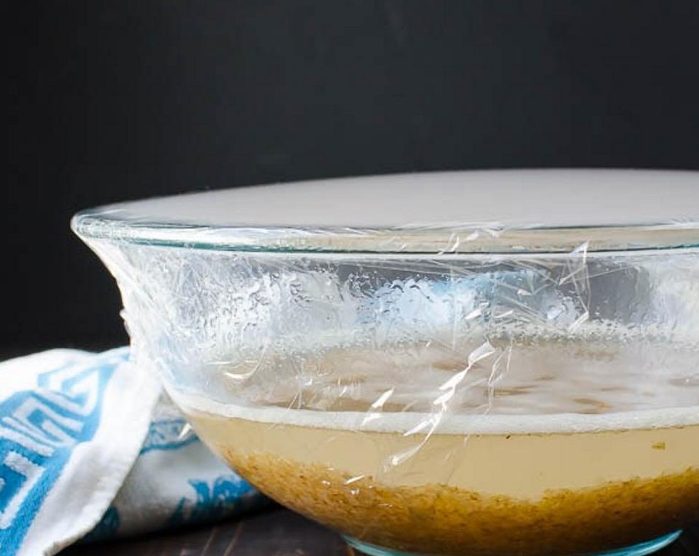 step 2 Bring the water to a boil. Place the dry Medium Grind Bulgur Wheat (1 cup) into a bowl. When the Water (2 1/2 cups) boils, pour it over the bulgur and cover with saran wrap. Set aside for 15 minutes to absorb the water.