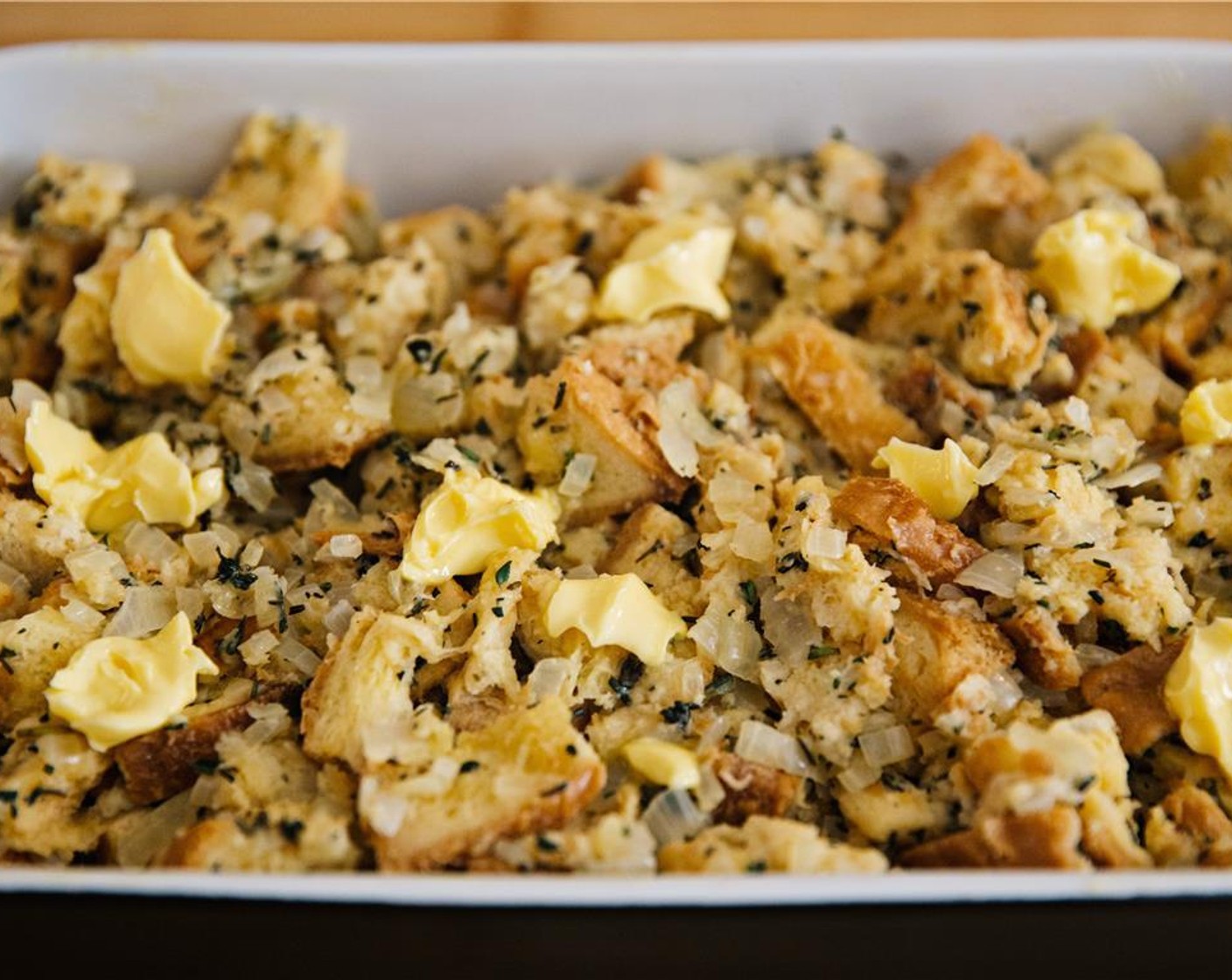 step 11 Place in an oven-proof dish and dot with remaining unsalted butter.