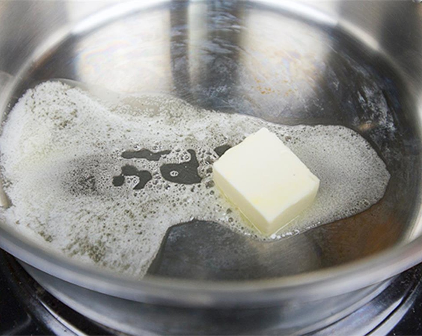 step 1 Melt the Butter (2 Tbsp) in a large pot.