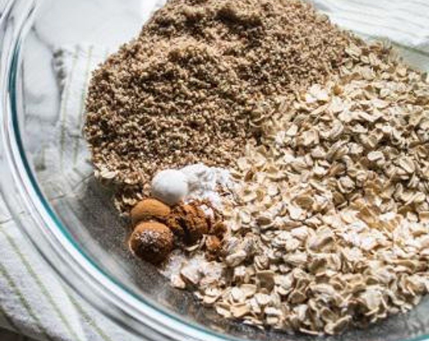 step 3 Add Old Fashioned Rolled Oats (3 cups), Pecan Meal (3/4 cup), Baking Powder (1 tsp), Simply Organic Cinnamon, Ground (1 tsp), and Sea Salt (1/8 tsp) into a large bowl, stir to combine.
