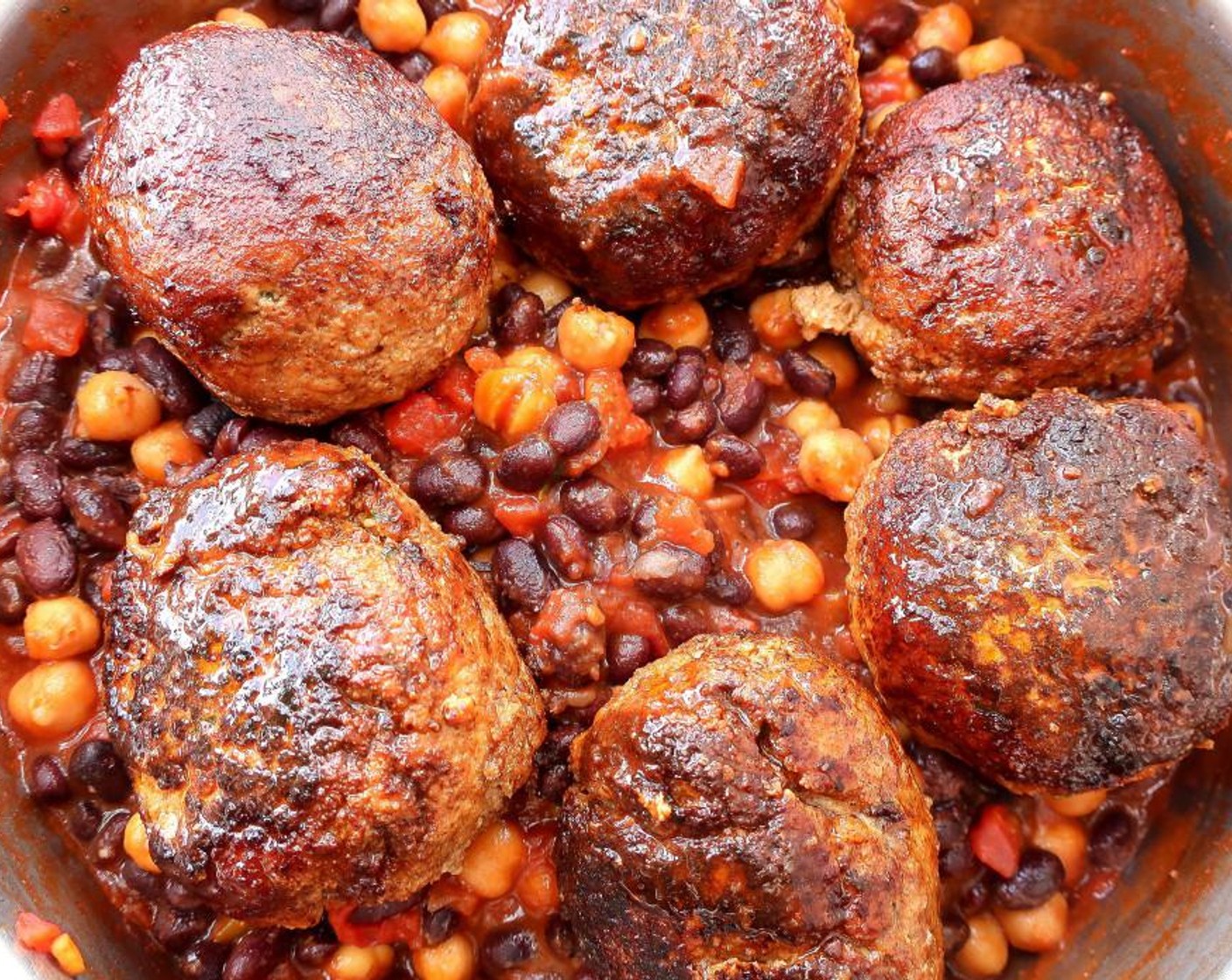 step 6 Add the meatballs, cover, and simmer slowly until cooked through but not dry.