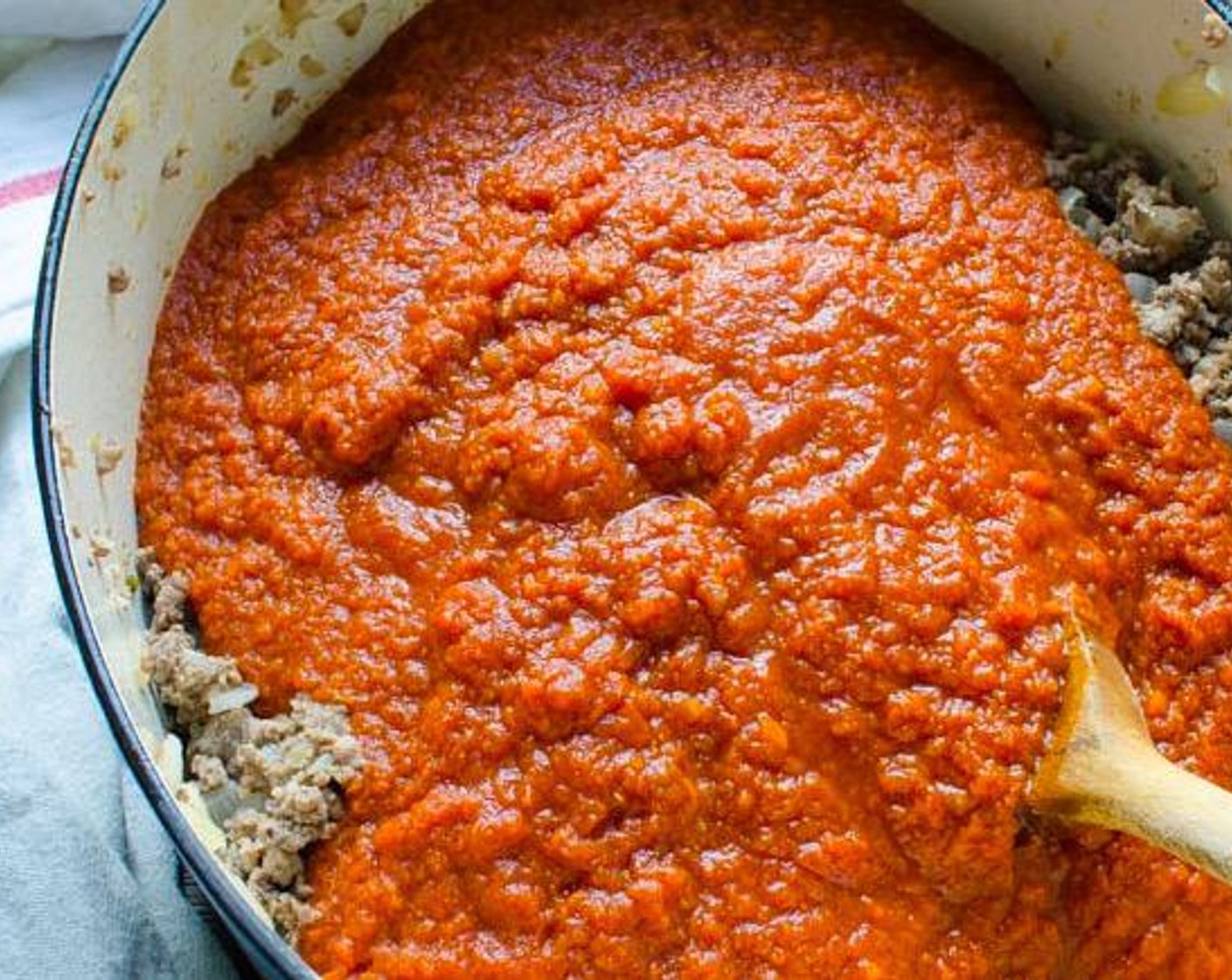 step 3 Cook until the meat is browned. Remove any excess fat from the browned meat and discard. Add Bay Leaves (2), Dried Basil (1 tsp), Dried Oregano (1 tsp), Crushed Red Pepper Flakes (1/4 tsp), and Marinara Sauce (4 cups). Stir to combine.