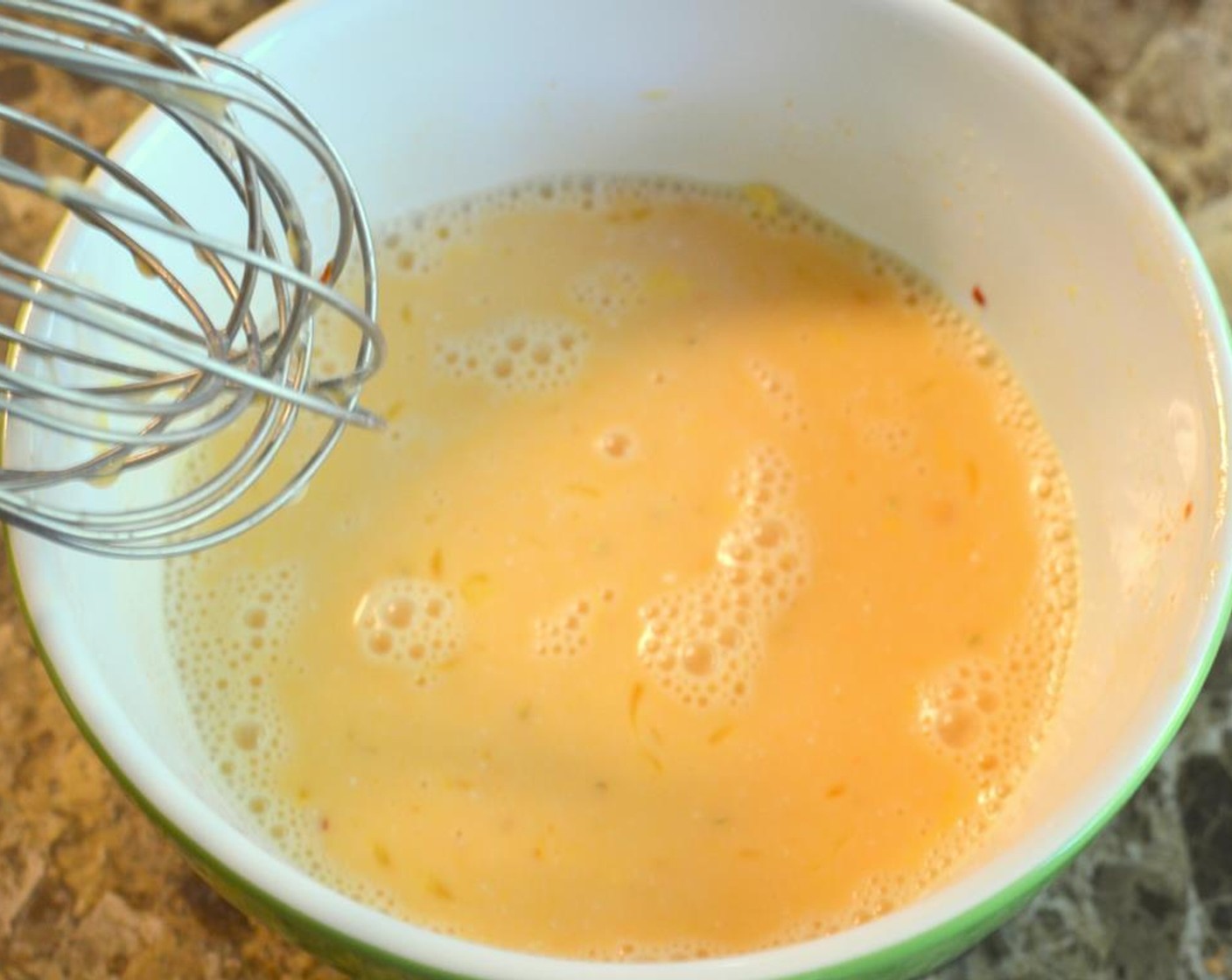 step 9 Pour the sauce into a saucepan and bring it to a gentle boil on a medium-high heat.