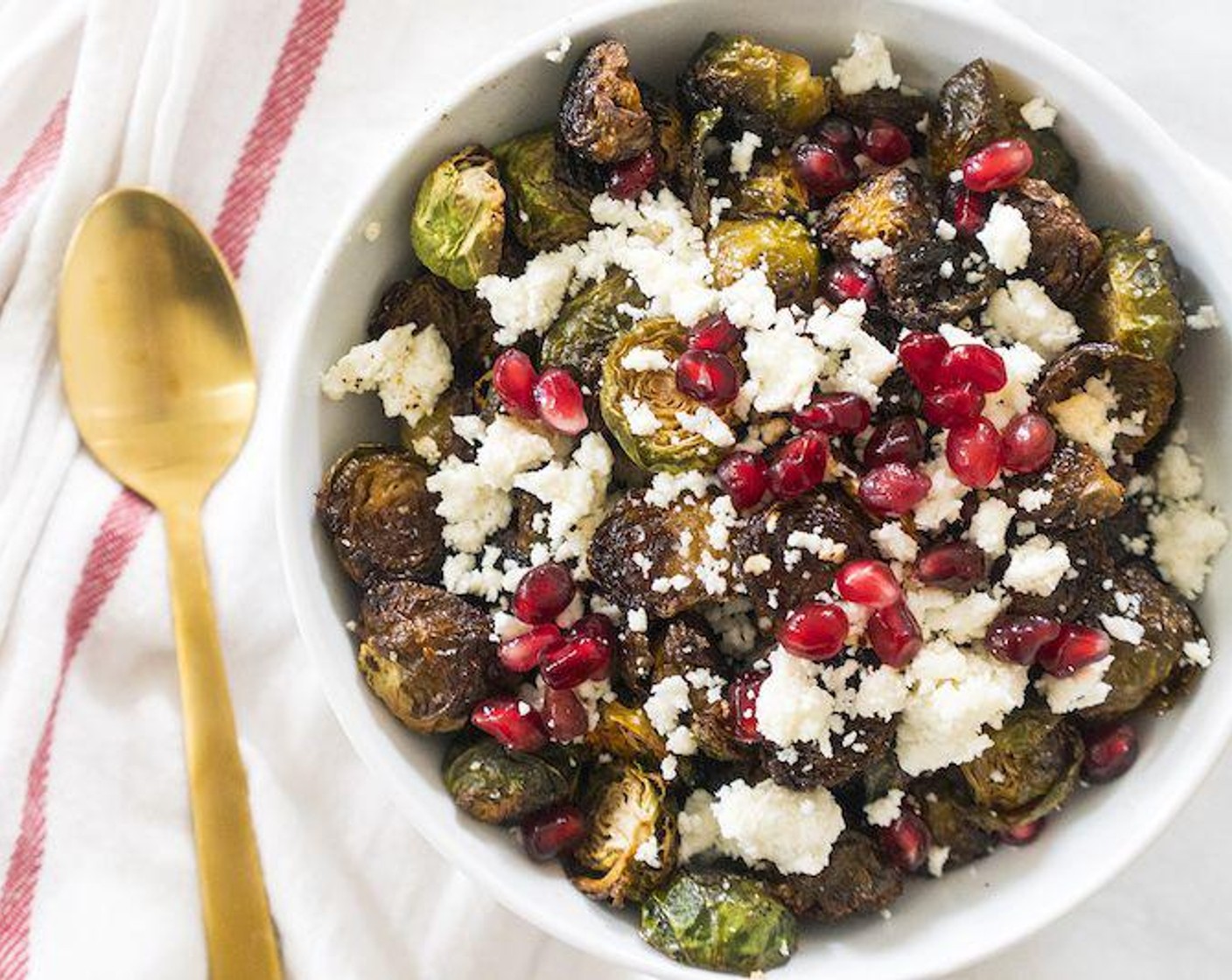 step 6 Before serving, top with crumbled Queso Fresco (1/4 cup) and Pomegranate Seeds (1/2 cup).