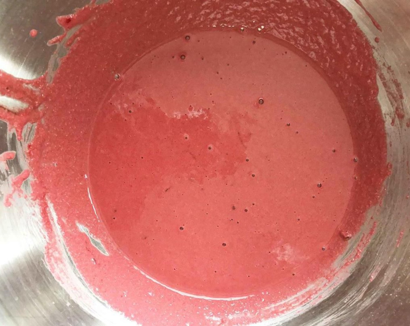 step 3 In another large bowl, whisk together the Pancake Mix (1 cup), Water (1 cup), Red Food Coloring (1 tsp), and Unsweetened Cocoa Powder (1 tsp) until well combined.