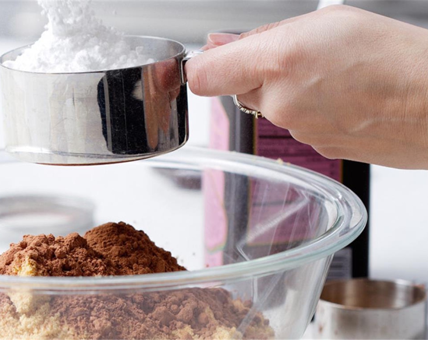 step 1 Grind the Coconut Cookies (2 cups) and melt the Coconut Oil (2 Tbsp), Mix the coconut cookies, Unsweetened Cocoa Powder (4 Tbsp), Coffee Liqueur (4 Tbsp), coconut oil, and Powdered Confectioners Sugar (1 cup) in a medium bowl.