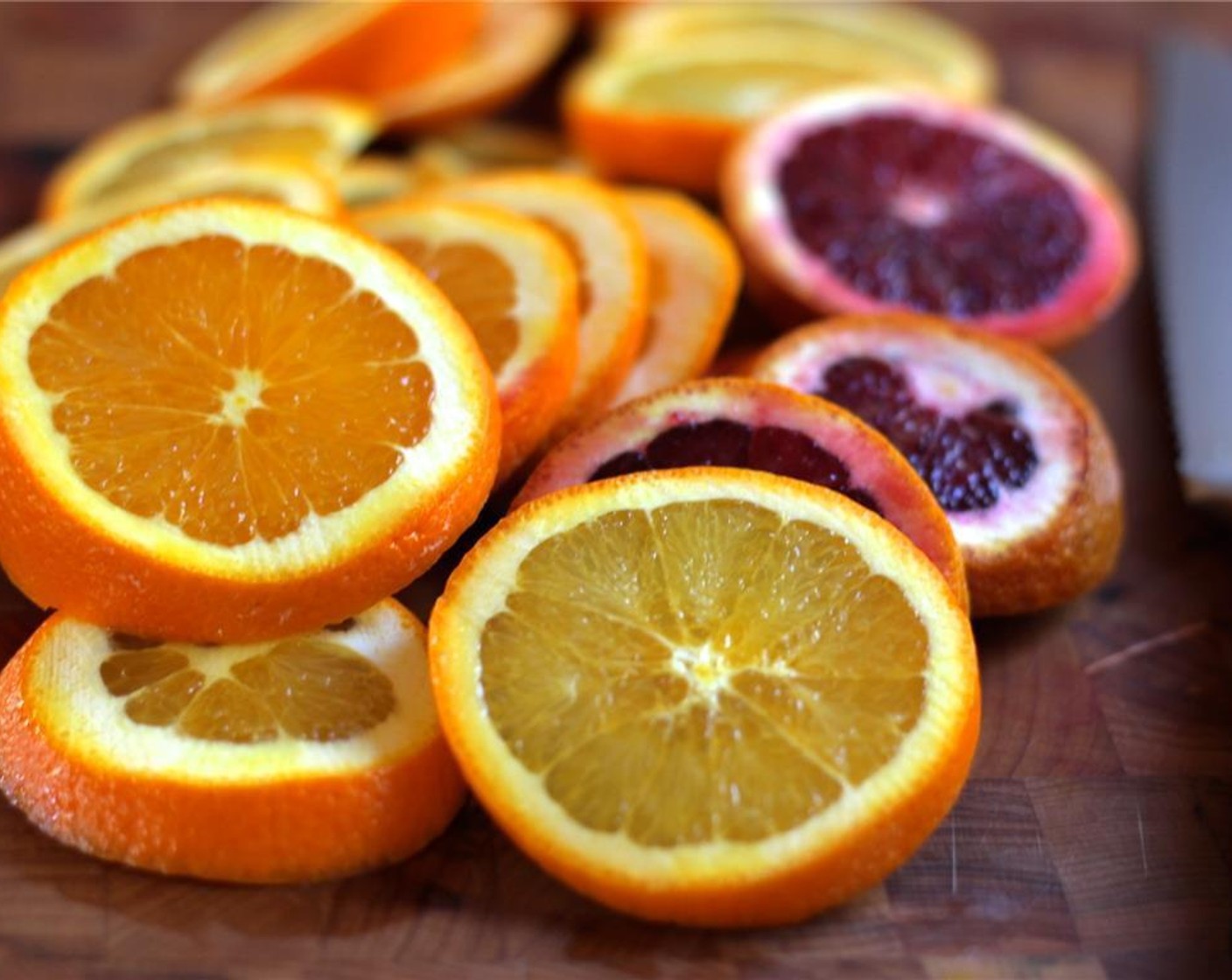 step 2 Slice the Orange (1) and Blood Oranges (2).