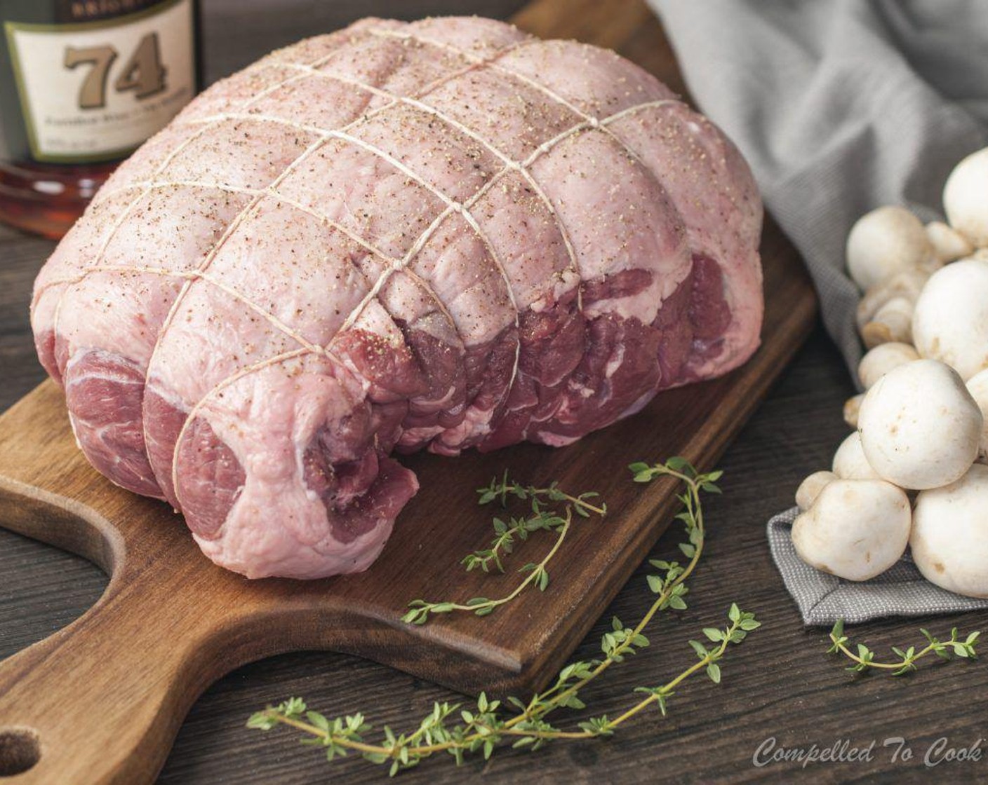 step 2 Season Lamb Shoulder (5 lb) generously with Salt (to taste) and Ground Black Pepper (to taste).