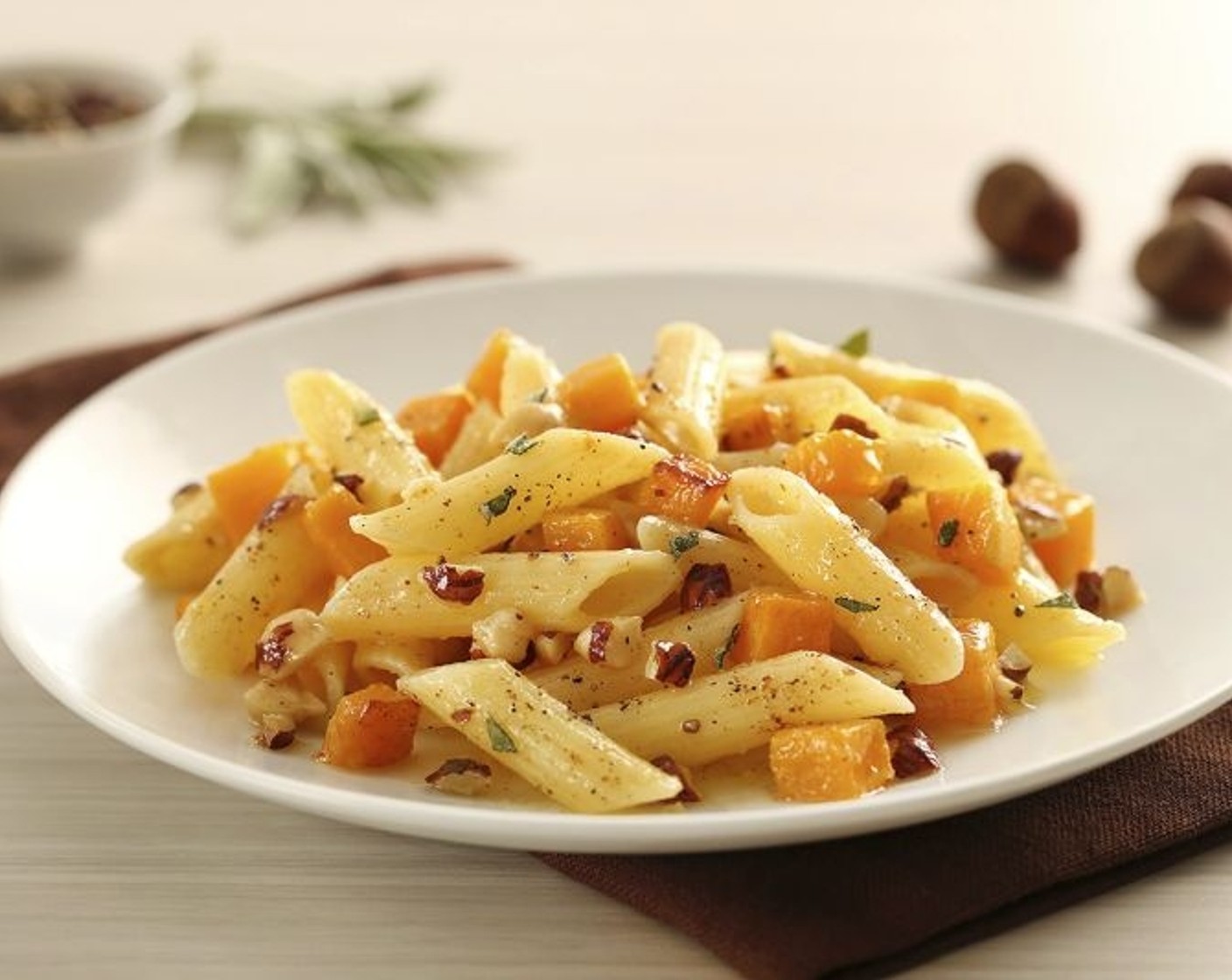 step 7 Add Sage Leaves (8) and Toasted Hazelnuts (1/2 cup) to brown butter and immediately spoon over the pasta.