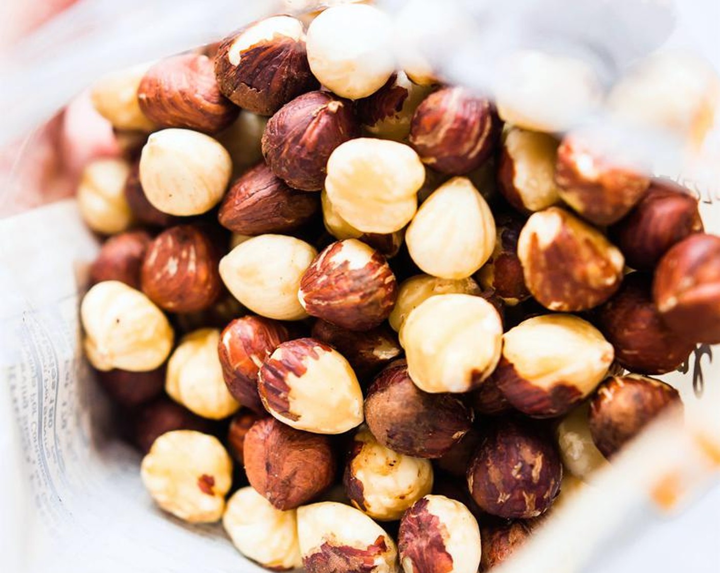 step 2 First blend your Hazelnuts (1 2/3 cups) and Dark Chocolate Chips (1/2 cup) in a food processor. Make a "mealy" base. It will be moist from the chocolate. Place in a bowl.