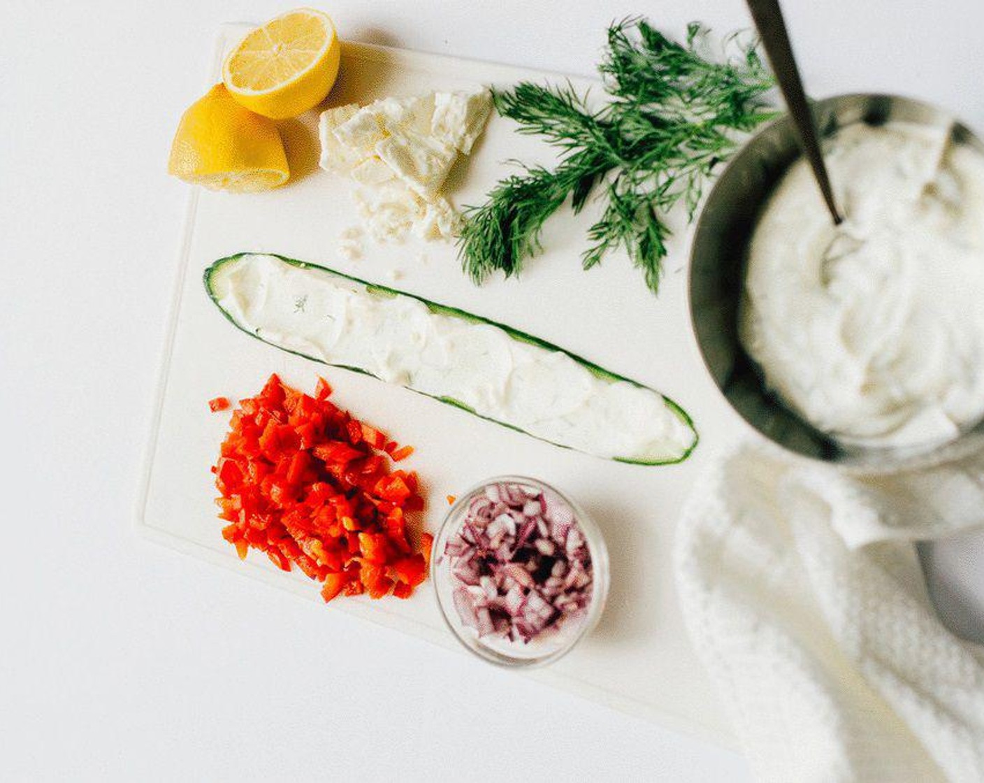 step 2 To make tzatziki, combine Plain Greek Yogurt (1/2 cup), juice from Lemon (1), Garlic (1 clove), Fresh Dill (1 tsp), Salt (to taste), and Ground Black Pepper (to taste).