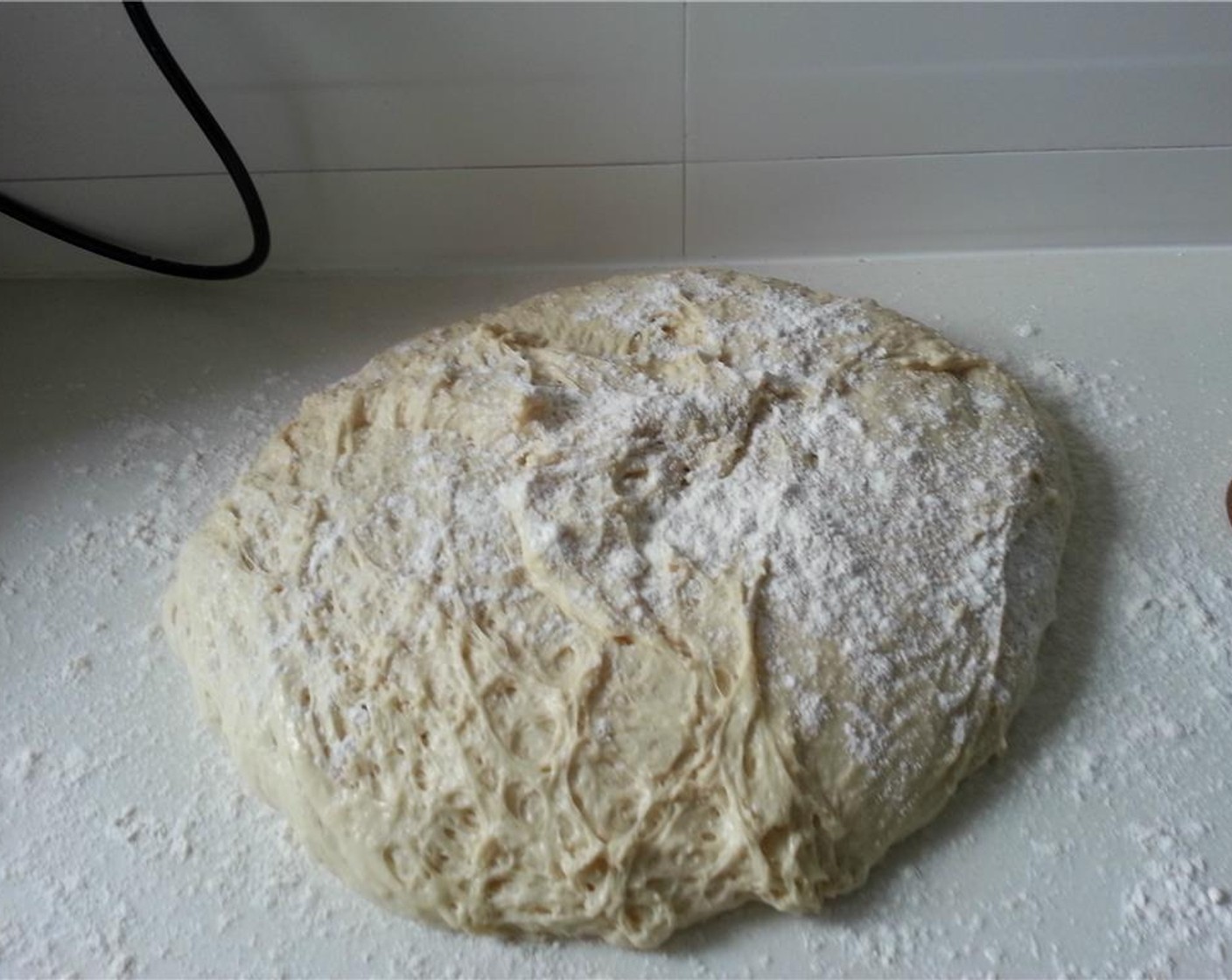 step 7 Preheat Oil (as needed) in a deep-fryer to 350 degrees F (180 degrees C). Turn out the dough onto a well floured surface, and make sure to flour the top.