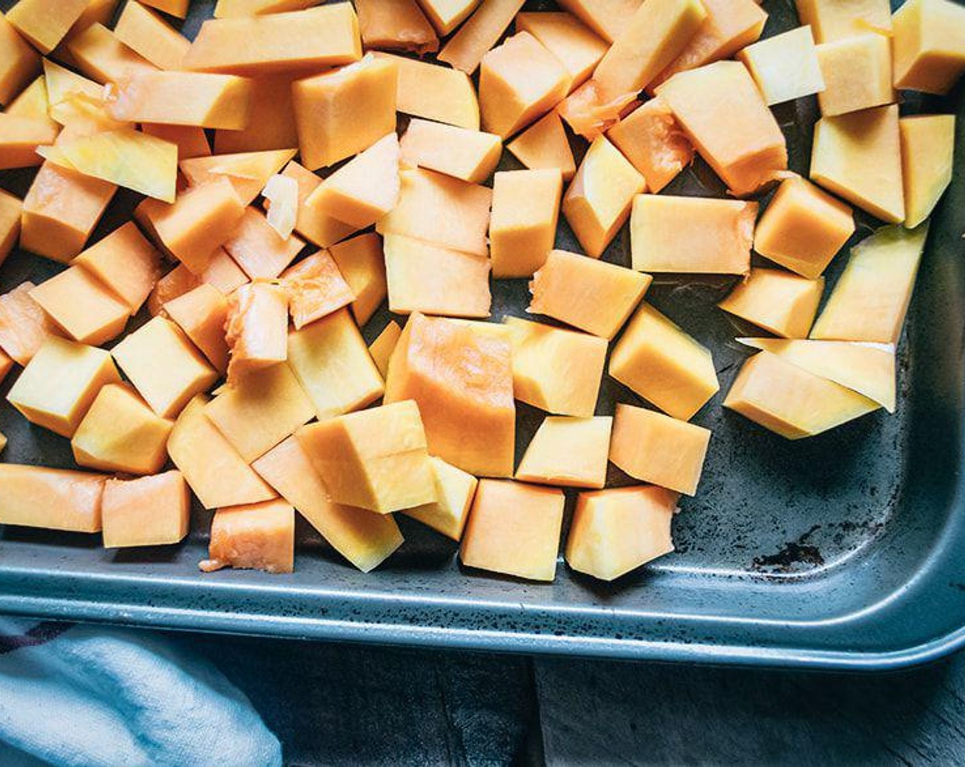 step 2 Grease a large baking sheet with Coconut Oil Cooking Spray (as needed) and spread Butternut Squash (3 cups) out in an even layer. Roast for 15 minutes, stir/flip, then roast another 10 minutes or until firm/tender but not overcooked. Set aside and turn the oven down to 350 degrees.