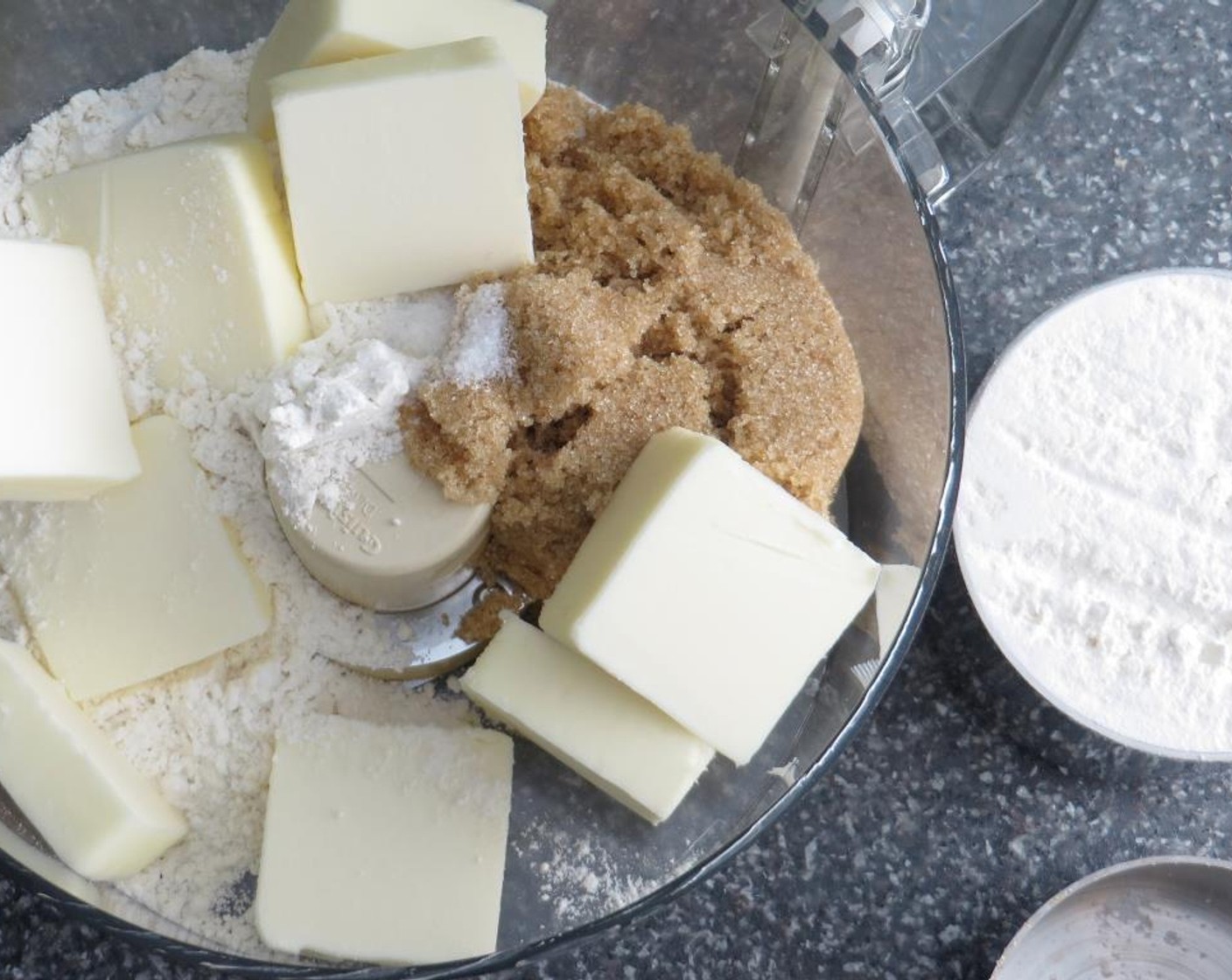 step 4 In a food processor, pulse together the All-Purpose Flour (2 cups), Brown Sugar (1/2 cup) and Salt (1/2 tsp). Add the Unsalted Butter (3/4 cup) and pulse until the mixture comes together into a ball.