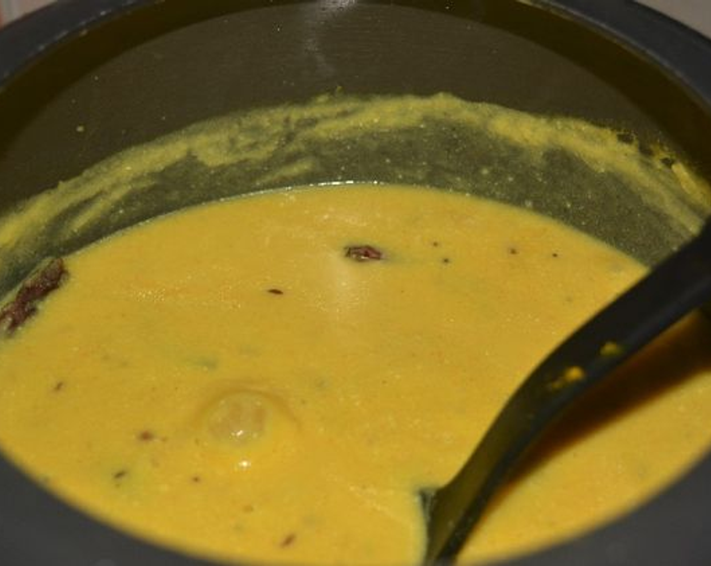 step 9 Bring the whole kadhi to a boil first in a high-medium flame and reduce the flame in medium heat and simmer for 8-10 minutes.