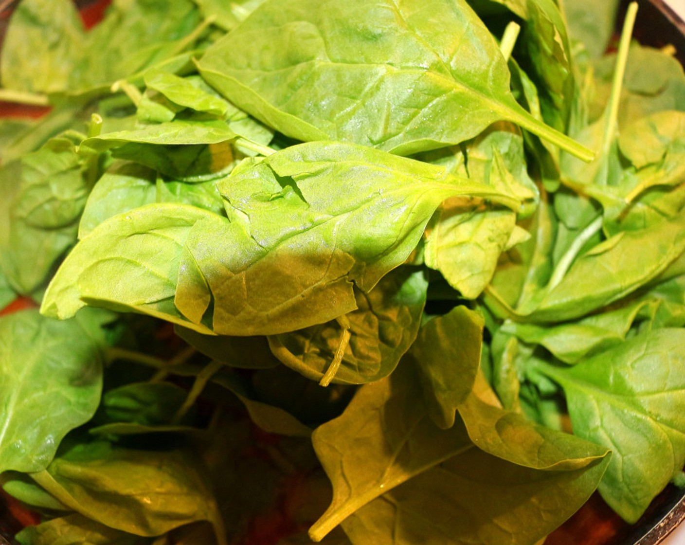 step 8 Add in the Fresh Baby Spinach (9 1/2 cups), and simmer for one more minute.