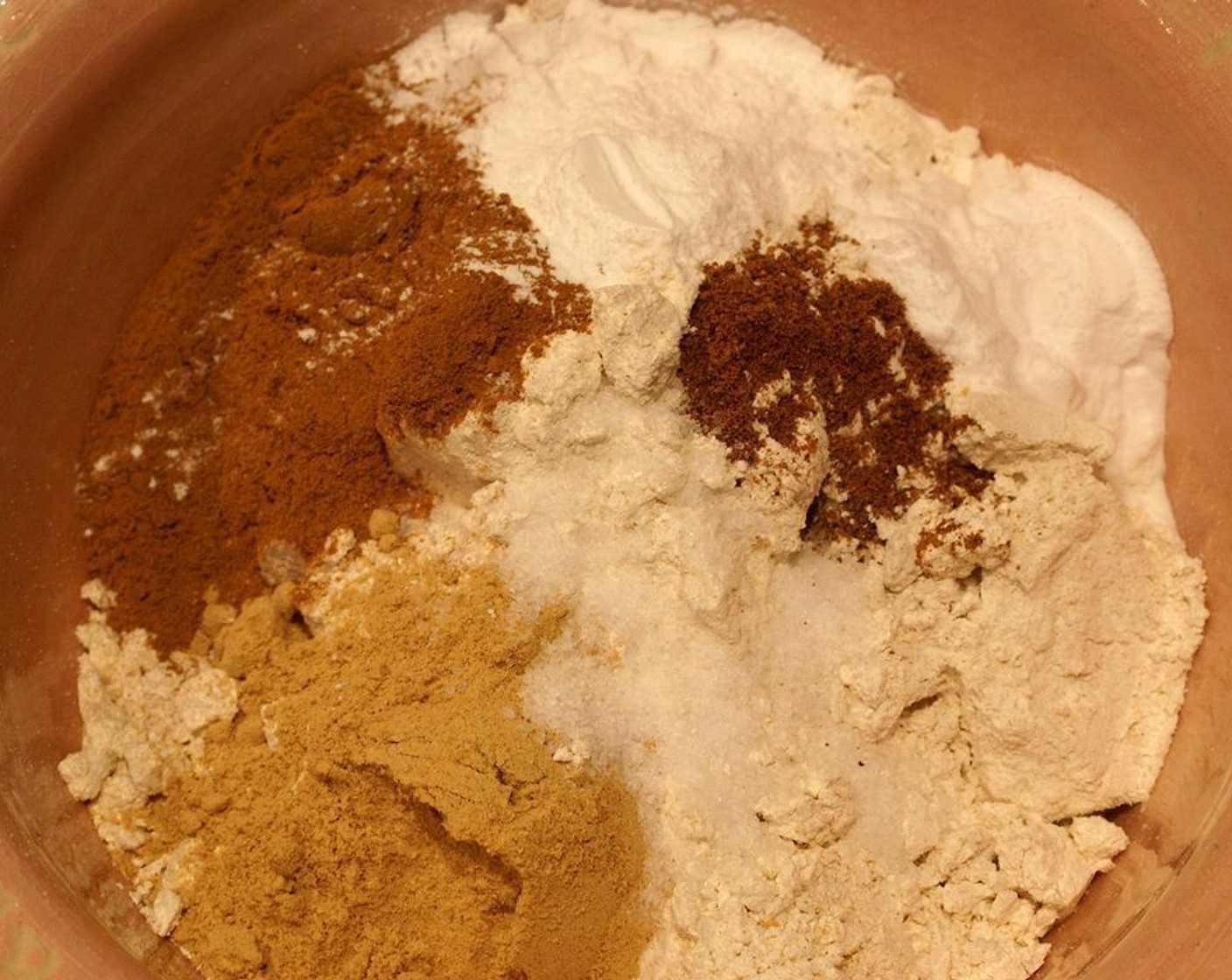 step 3 Whisk Whole Wheat Pastry Flour (2 cups), Baking Powder (1/2 Tbsp), Baking Soda (1/2 Tbsp), Ground Ginger (2 Tbsp), Ground Cinnamon (1 Tbsp), Ground Nutmeg (1/4 tsp), and Salt (1 tsp) together in a bowl. Add in Vanilla Extract (1 Tbsp).