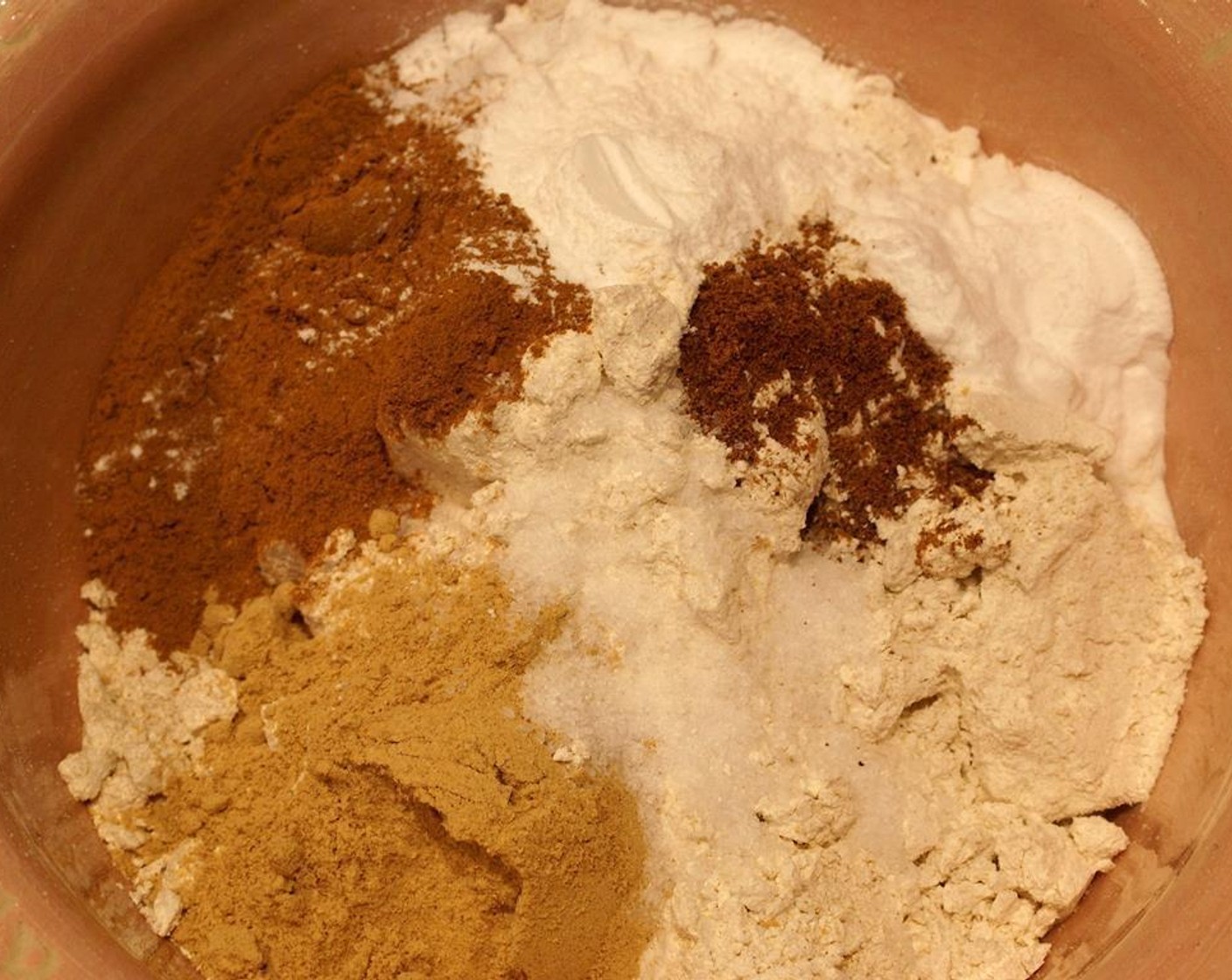 step 3 Whisk Whole Wheat Pastry Flour (2 cups), Baking Powder (2 tsp), Baking Soda (2 tsp), Ground Ginger (2 Tbsp), Simply Organic Cinnamon, Ground (1 Tbsp), Ground Nutmeg (1/4 tsp), and Salt (1 tsp) together in a bowl. Add in Vanilla Extract (1 Tbsp).