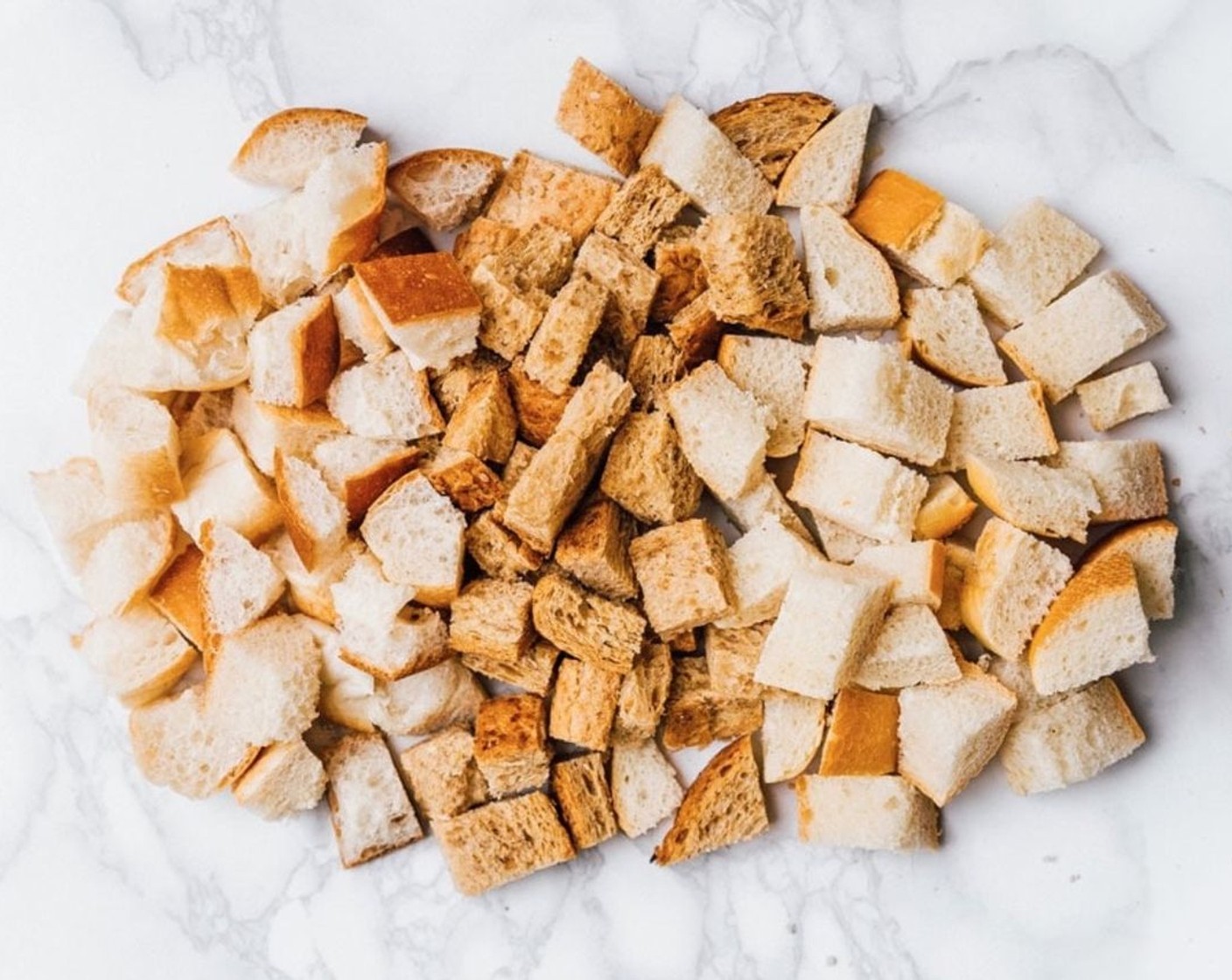 step 1 Cut or tear the Bread (3 cups) into bite-sized chunks. You can leave the crust on or tear it off, your preference!